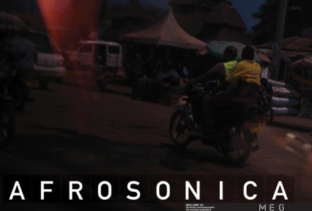 Couverture du LP Afrosonica. Le titre Afrosonica en bas de l'image écrit en blanc et majuscule. Une image sombre et floue avec deux personnes de dos sur une moto au premier plan. Deuxième plan on distingue des voitures et un toit.